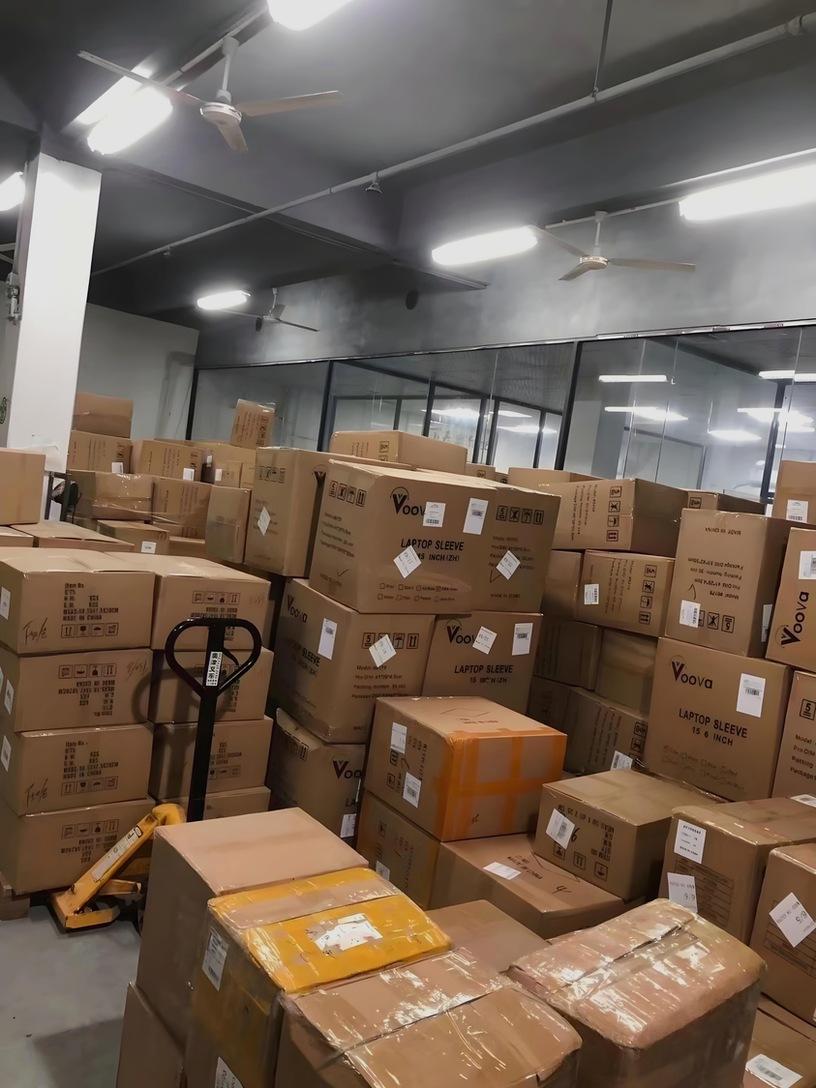 Consolidation warehouse stacked with packed parcels ready to ship